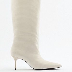 White pointed toe knee high boots